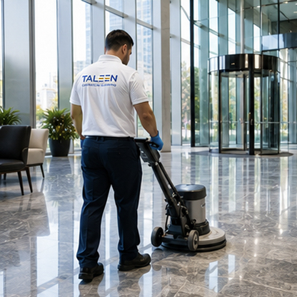 Taleen technician machine-scrubbing the floor of a multi-tenant building lobby
